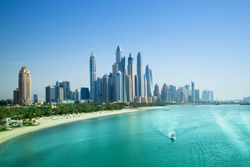 Wall Mural - Dubai, UAE United Arabs Emirates. City of skyscrapers, Dubai marina in the sunny day with front line of beach hotels and blue water of Persian gulf 