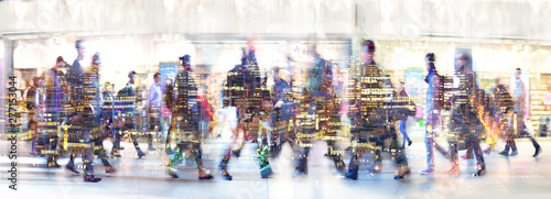 Fotomural  Beautiful motion blur of walking people in train station