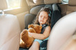 Cute little baby child sitting in car seat. Portrait of cute little baby child sitting in car seat.Safety concept.