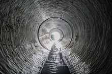 Exit From The Drainage Sewage Tunnel Pipe. Concrete Drainage Pipe, Collector Of City Sewage System