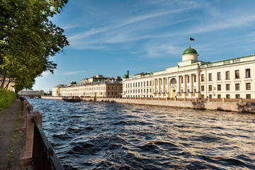 Buildings on the Fontanka river embankment in St. Petersburg, summer garden, landscape