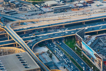 Wall Mural - Dubai, United Arab Emirates - July 5, 2019: Roads and streets of Dubai downtown leading to Dubai mall parking