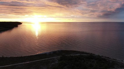 Wall Mural - Beautiful sunset over the sea. Shot on drone
