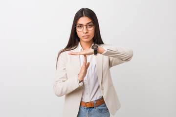 Young business arab woman isolated against a white background showing a timeout gesture.