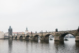 Fototapeta Londyn - Beautiful view of the urban architecture in Prague in the Czech Republic. The Charles Bridge.