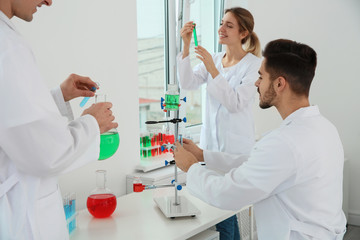 Poster - Medical students working in modern scientific laboratory