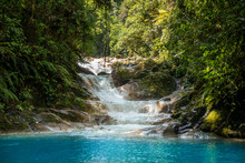 Blue Falls Of Costa Rica, Natural Landscape At Bajos Del Toro Close To The Catarata Del Toro And San Jose. Photo Taken At Slow Shutter Speed And With ND Filter. Smooth Waterfall. 