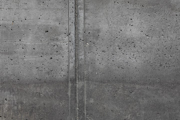 Grey textured concrete wall exterior