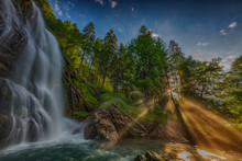 Magic Waterfall With Beautiful Sun Beams