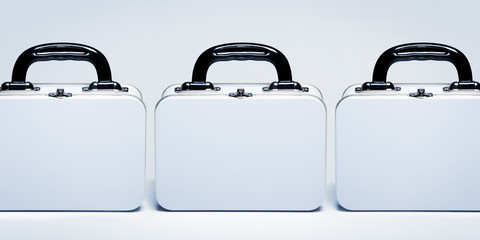 Row of white tin lunchboxes with copy space