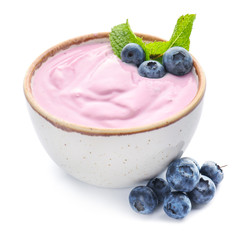 Bowl with tasty blueberry yogurt on white background