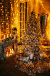 warm cozy evening in Christmas room interior design,Xmas tree decorated by lights gifts,toys, deer,candles, lanterns, garland lighting indoors fireplace.holiday.magic New year