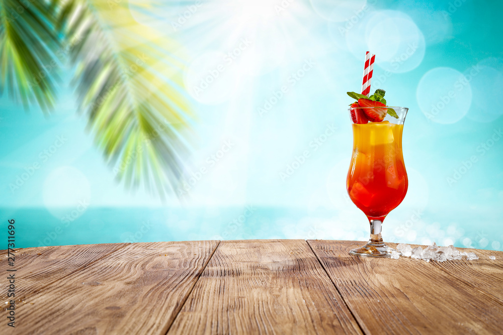 Summer drink sunrise on desk and beach landscape  - obrazy, fototapety, plakaty 
