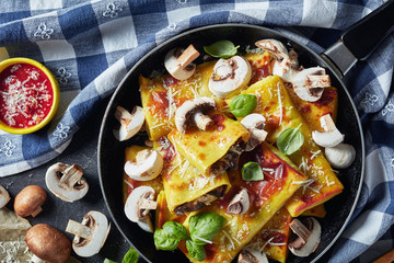 Canvas Print - Crepes with cheese and mushroom filling, flatlay