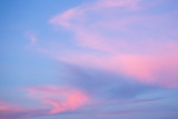Fototapeta Tęcza - Blue sky and pink clouds. Sunset. Abstract background.