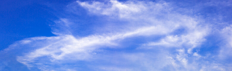 Wall Mural - Panorama blue sky with tiny clouds