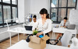 © Syda Productions - business, firing and job loss concept - sad fired female office worker packing her personal stuff and leaving