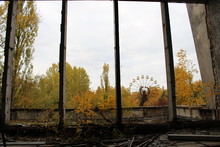 Old Ferris Wheel In The Ghost Town Of Pripyat. Consequences Of The Accident At The Chernobil Nuclear Power Plant