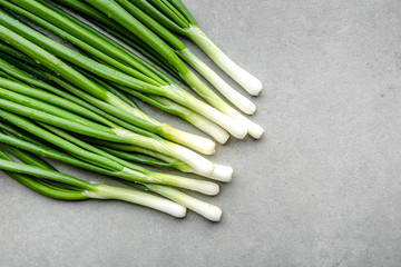 Wall Mural - Green onion, freshly harvested spring onion bunch