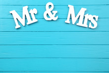 White Letters Mr And Mrs On Blue Wooden Table