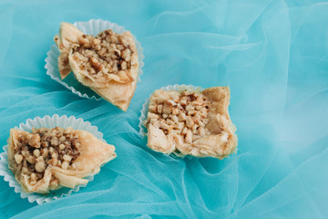 Wall Mural - Baklava dessert. Pastry made of layers of filo filled with chopped nuts and sweetened and held together with syrup or honey