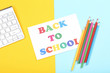 © 5second - Text Back To School with computer keyboard and pencils on colorful background