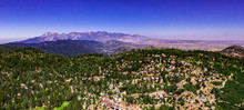 Panoramic, Drone View Of The San Gabriel Mountains, California Leading Into The High Desert Seen From Lake Arrowhead On A Clear Summer Dy