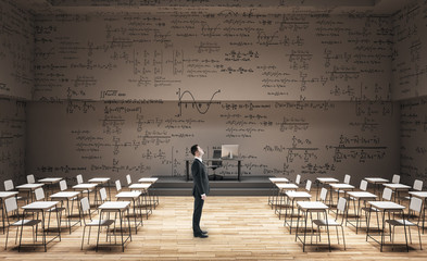 Wall Mural - Businessman in clean classroom