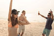 © Atstock Productions - Group of friends having party at the beach in summer