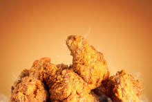 Fried Chicken Or Crispy Kentucky On Brown Background. Delicious Hot Meal With Fast Food.