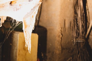 Super dusty spider web in a old creepy house 