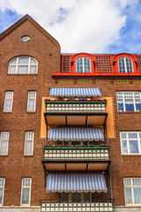 Sticker - Old apartment building with balconies