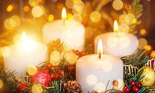 Candles Light. Christmas Candles Burning At Night. Abstract Candles Background. Golden Light Of Candles Flame.
