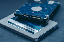 SSD Drive And 2.5 HDD Drive. Solid State Drive Vs Traditional HDD, Isolated. Fast Storage Device Vs Slow.