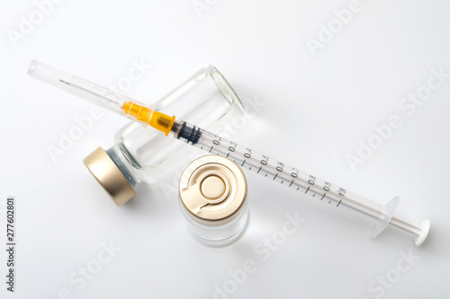 Fotomural Vaccines, botulinum toxin and insulin ampules concept theme with glass vials wit
