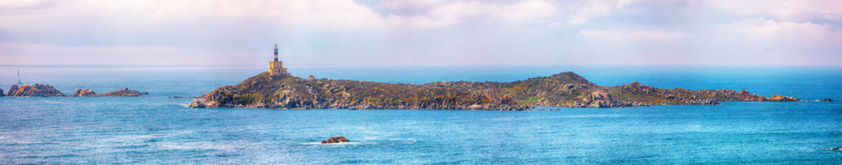 Wall Mural - Fantastic view of Capo Carbonara lighthouse with turquoise water.