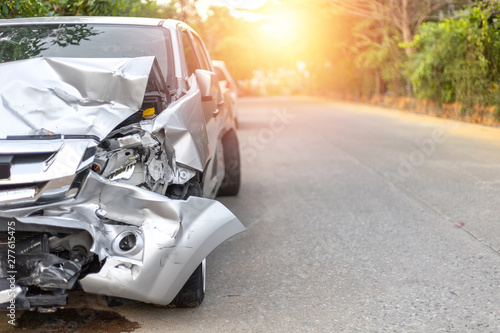 Fotomural Front of light gray color car with pick up have big damaged and broken by accident on road in morning time can not drive any more park for wait insurance officer