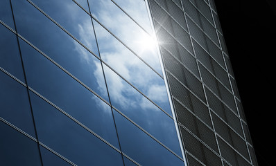 Abstract steel and glass facade detail background of high rise commercial building .Business or industrial successful concept background .