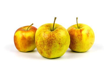 Three apples on a white background.