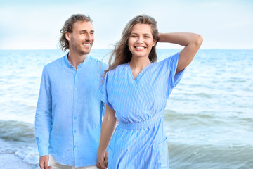 Sticker - Happy young couple at sea resort