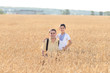 © vik_li - Father and son are in the wheat field. Ukrainian family. Father's day. Boy with father. Day of Independence