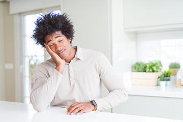 Canvas Print - African American man at home thinking looking tired and bored with depression problems with crossed arms.