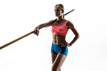 Wall Mural - Power and beauty and purity. Professional female pole vaulter training on white studio background. Fit and slim female model practicing. Concept of sport, healthy lifestyle, action, movement, motion.