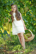 © nuzza11 - Child with grapes on nature.