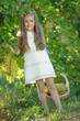 © nuzza11 - Child with grapes on nature.