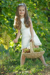 © nuzza11 - Child with grapes on nature.