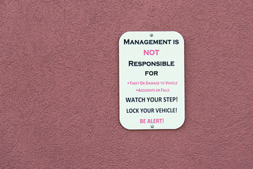 Management Is Not Responsible For, Sign on a Building