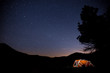 © Tandem Stock - View of illuminated tent against starry sky