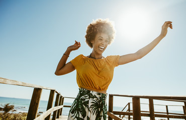 Wall Mural - Woman having fun on summer vacation