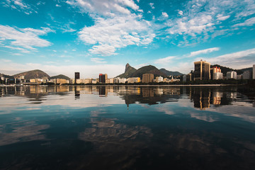 Fototapete - Panoramic View of Buildings Reflected on Water in Botafogo, Rio de Janeiro, Brazil